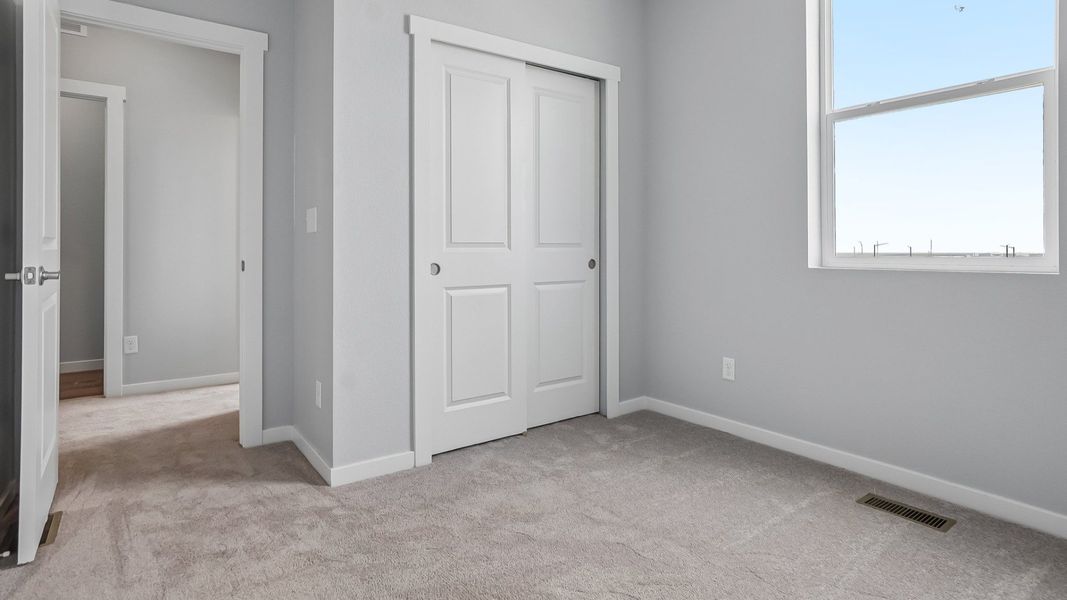 Furnished interior view inside a new home in Windler Townhomes, Aurora (Image 23).