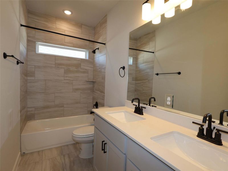 Furnished interior view inside a new home in Cedar Brook, Leander (Image 6). Furnished interior view inside a new home in Cedar Brook, Leander (Image 6).