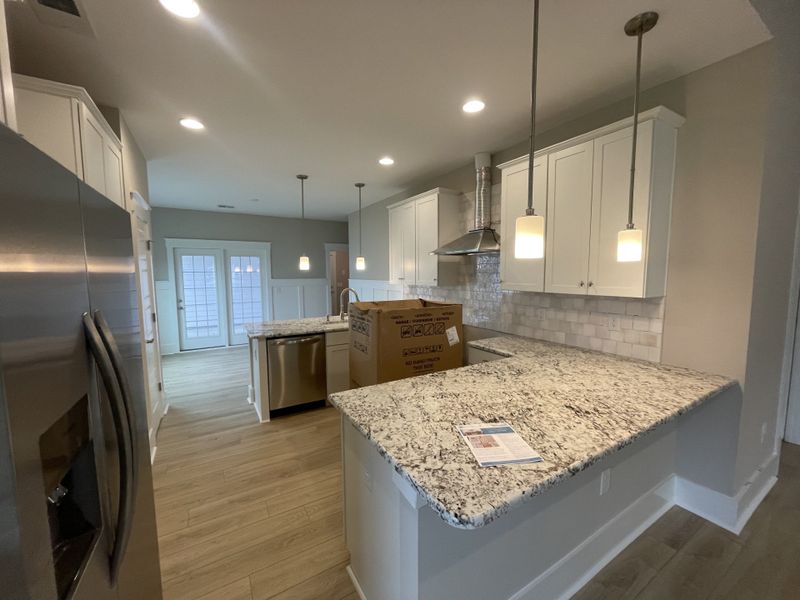 Furnished interior view inside a new home in The Sanctuary at Sunset Beach, Sunset Beach (Image 6).
