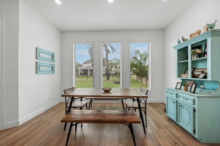 Furnished interior view inside a new home in The Highlands: Pinnacle Collection, Porter Heights (Image 6).