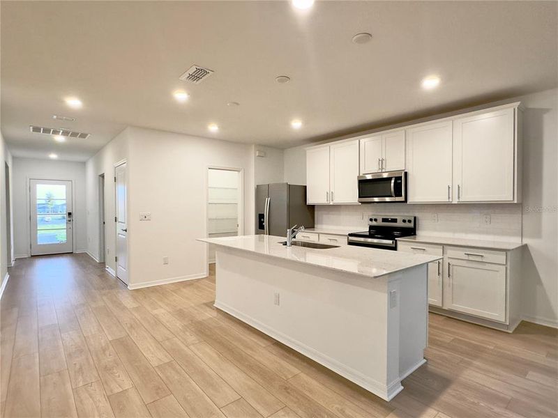 Furnished interior view inside a new home in Parkside Trails, Clermont (Image 8).