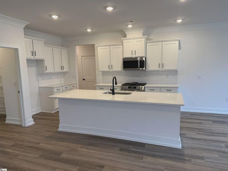 Furnished interior view inside a new home in Hidden Lake Estates, Greenville (Image 8).
