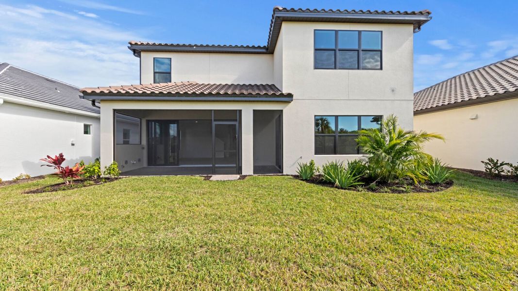 Exterior details and patio area of a home in SkySail, Naples (Image 3).