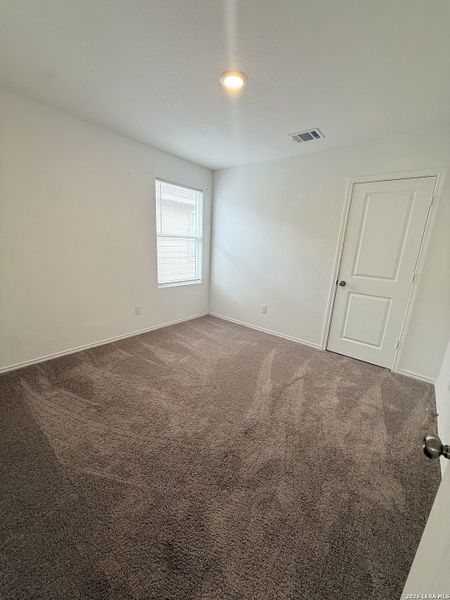 Spacious, unfurnished interior of a new home in Crescent Hills: Stonehill Collection, San Antonio (Image 9).