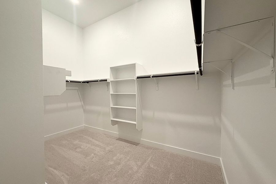 Spacious, unfurnished interior of a new home in The Grove at Blackhawk, Pflugerville (Image 23).