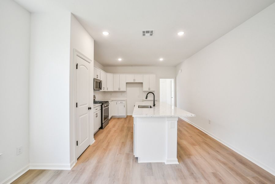 Furnished interior view inside a new home in Mostyn Springs, Magnolia (Image 9).