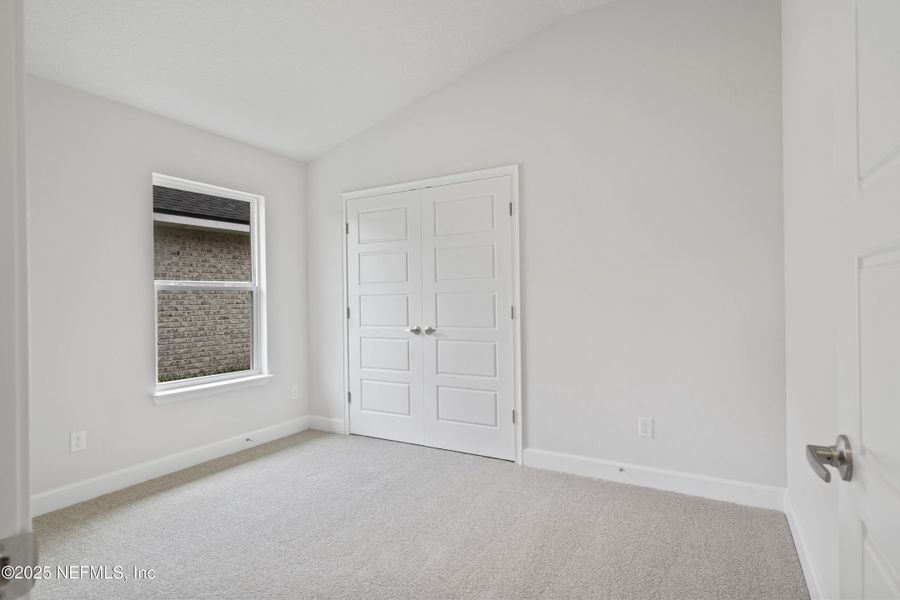 Spacious, unfurnished interior of a new home in Shadow Crest at Rolling Hills, Green Cove Springs (Image 9).