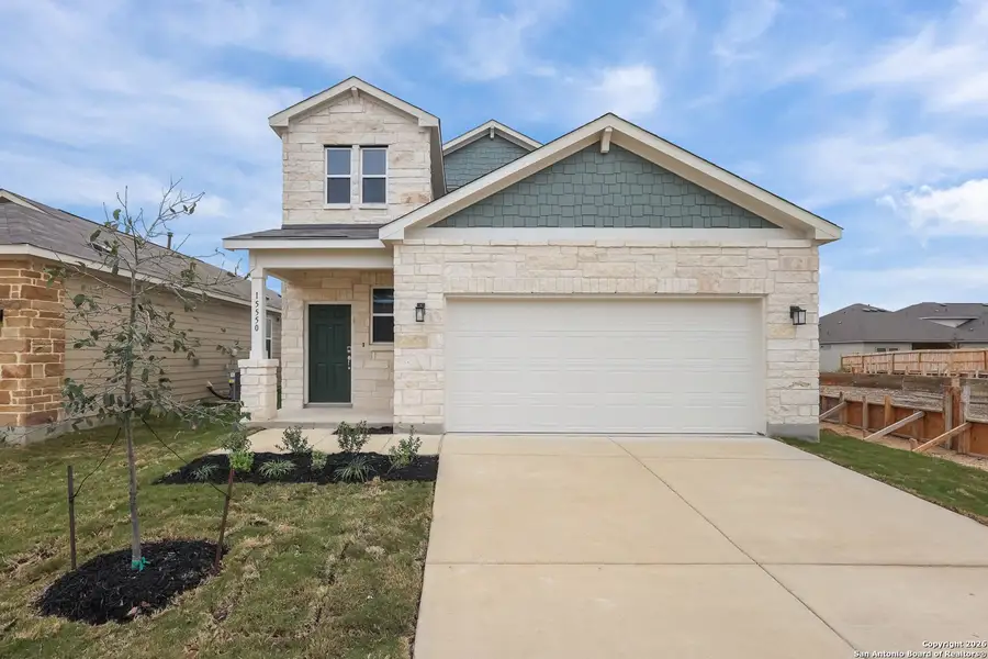 Front exterior of a new home in Summerlin, San Antonio, TX, highlighting curb appeal (Image 1). Front exterior of a new home in Summerlin, San Antonio, TX, highlighting curb appeal (Image 1).