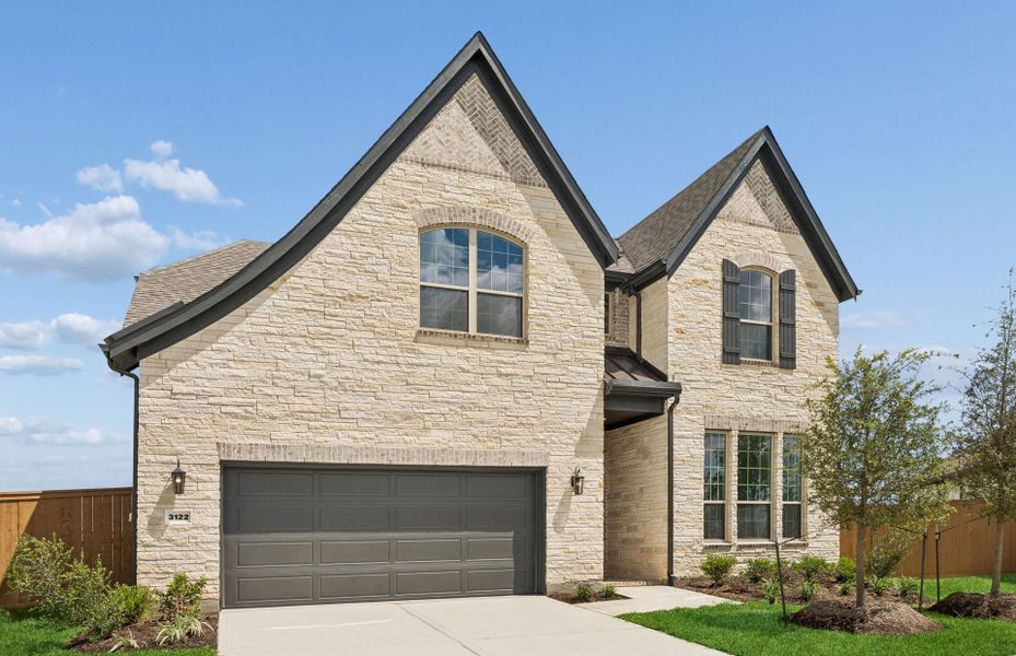 Front exterior of a new home in Lago Mar, Texas City, TX, highlighting curb appeal (Image 1). Front exterior of a new home in Lago Mar, Texas City, TX, highlighting curb appeal (Image 1).