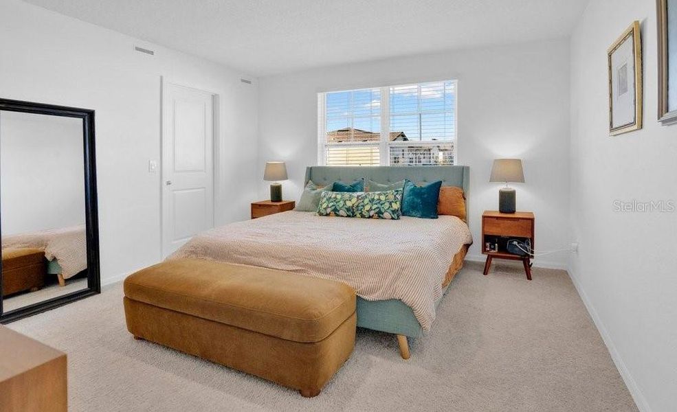 Furnished interior view inside a new home in Northlake at Ovation, Winter Garden (Image 17).