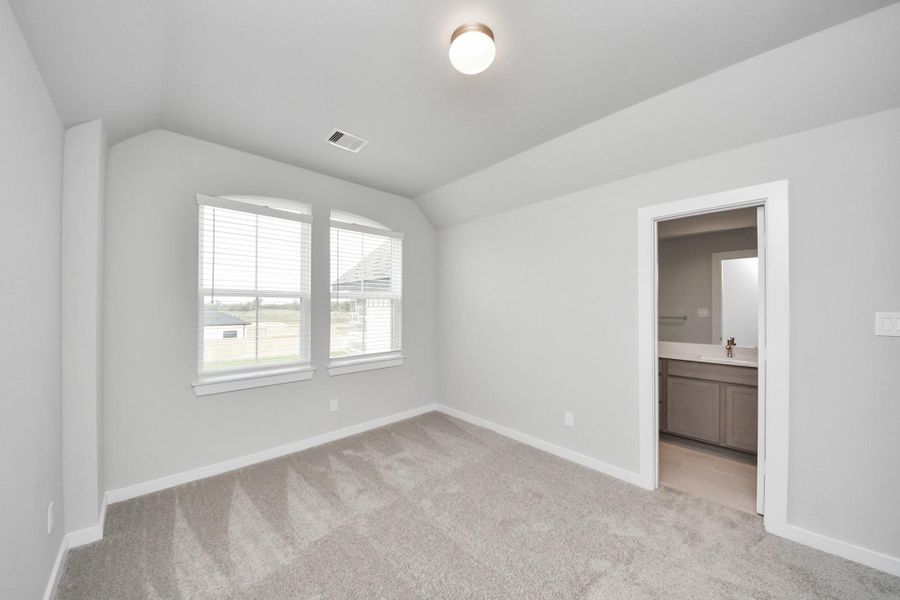 Generously sized secondary bedrooms featuring spacious closets, soft and inviting carpeting underfoot, large windows allowing plenty of natural light, and the added touch of privacy blinds for your personal retreat. Generously sized secondary bedrooms featuring spacious closets, soft and inviting carpeting underfoot, large windows allowing plenty of natural light, and the added touch of privacy blinds for your personal retreat.