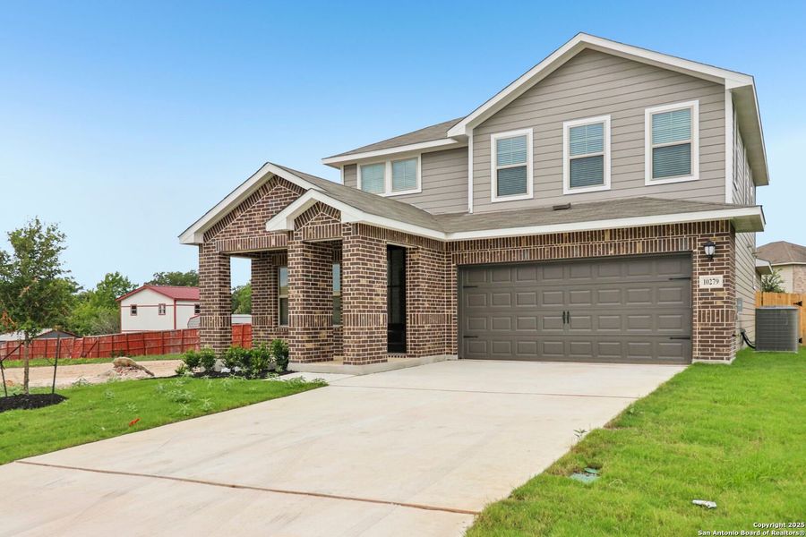 Front exterior of a new home in Royal Crest, San Antonio, TX, highlighting curb appeal (Image 25). Front exterior of a new home in Royal Crest, San Antonio, TX, highlighting curb appeal (Image 25).