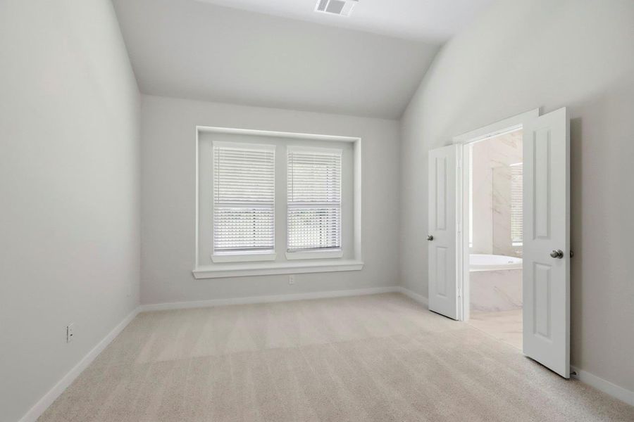 Primary suite is a true retreat with a view of the trees! Primary suite is a true retreat with a view of the trees!