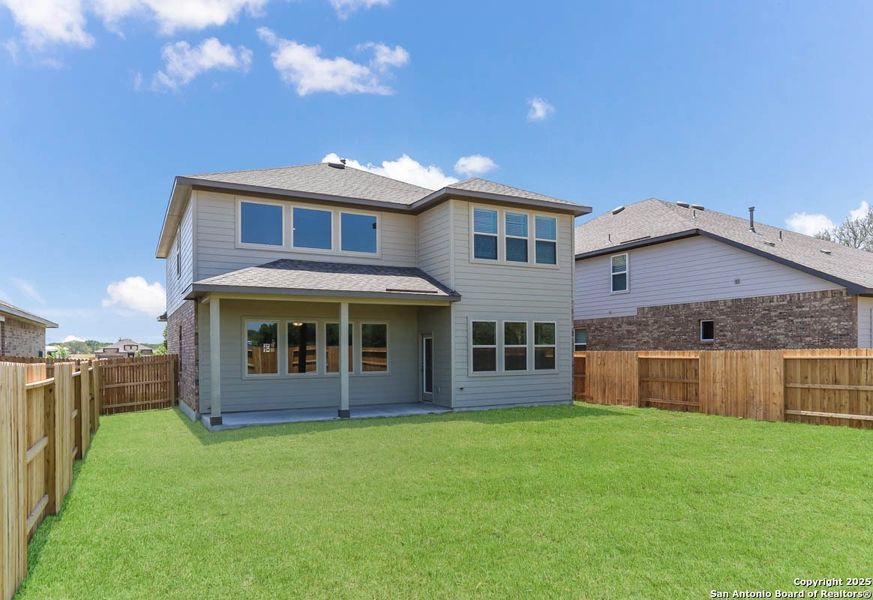 Front exterior of a new home in Buffalo Crossing – New Phase Now Preselling, Cibolo, TX, highlighting curb appeal (Image 15).