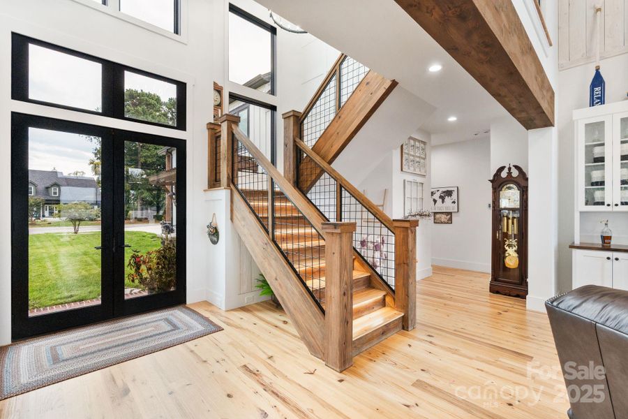 Metal railing with wood staircase add modern farmhouse detail Metal railing with wood staircase add modern farmhouse detail