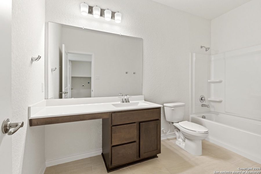Furnished interior view inside a new home in Woodside Farms, Seguin (Image 6).