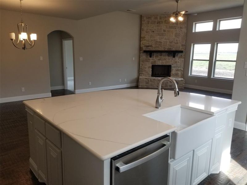 Huge kitchen island would be great while entertaining.