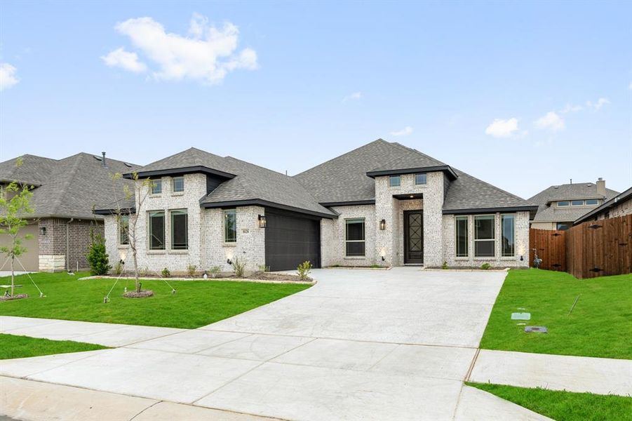 Front exterior of a new home in Star Ranch, Godley, TX, highlighting curb appeal (Image 19).
