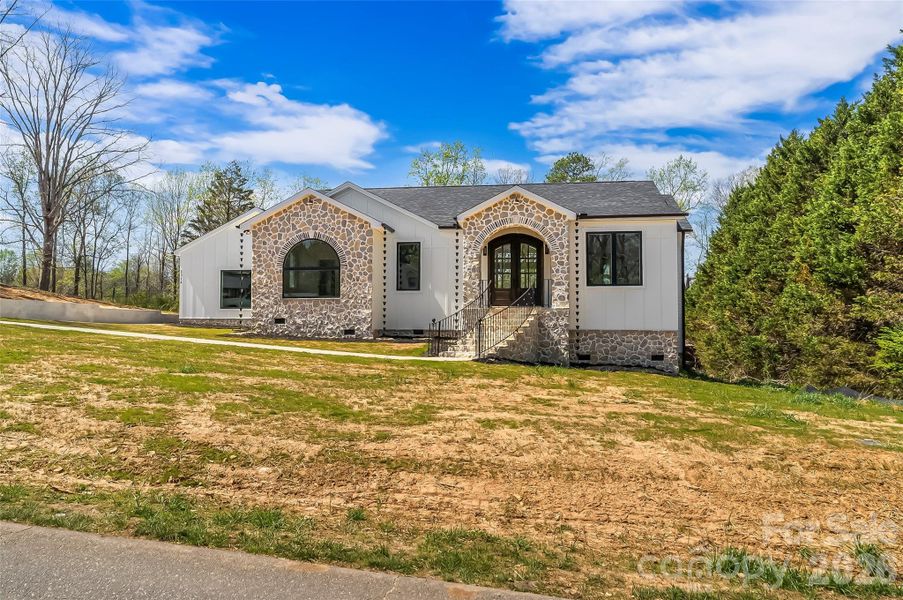 Front exterior of a new home in , Connelly Springs, NC, highlighting curb appeal (Image 25).