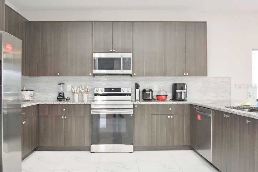 Furnished interior view inside a new home in , Haines City (Image 7).