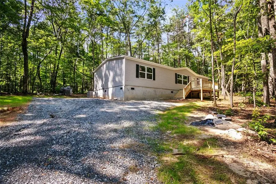 Exterior details and patio area of a home in , Ellijay (Image 18).