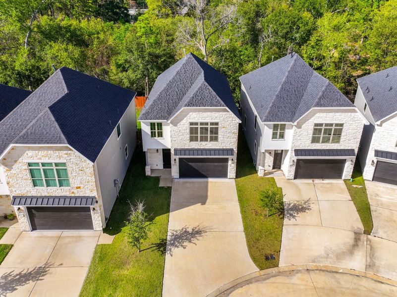 Front exterior of a new home in , Houston, TX, highlighting curb appeal (Image 21).