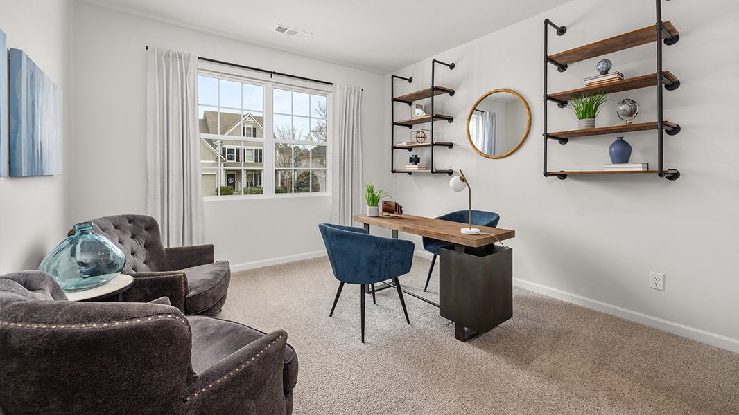 Representative furnished interior of a home built from the HANOVER by D.R. Horton in The Ranch, Holly Hill (Image 9).
