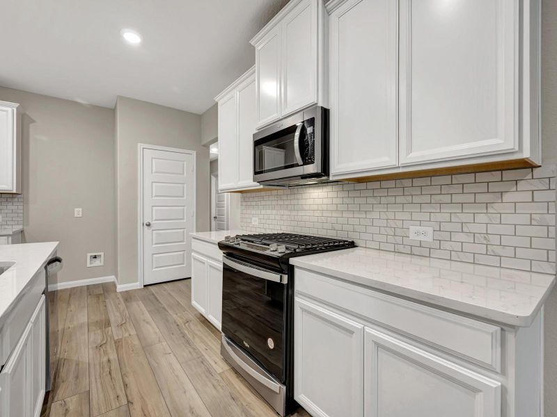 Photo is not of the actual home, but is an inspirational photo of builder’s model home and may depict options, furnishings, and/or decorator features that are not included
