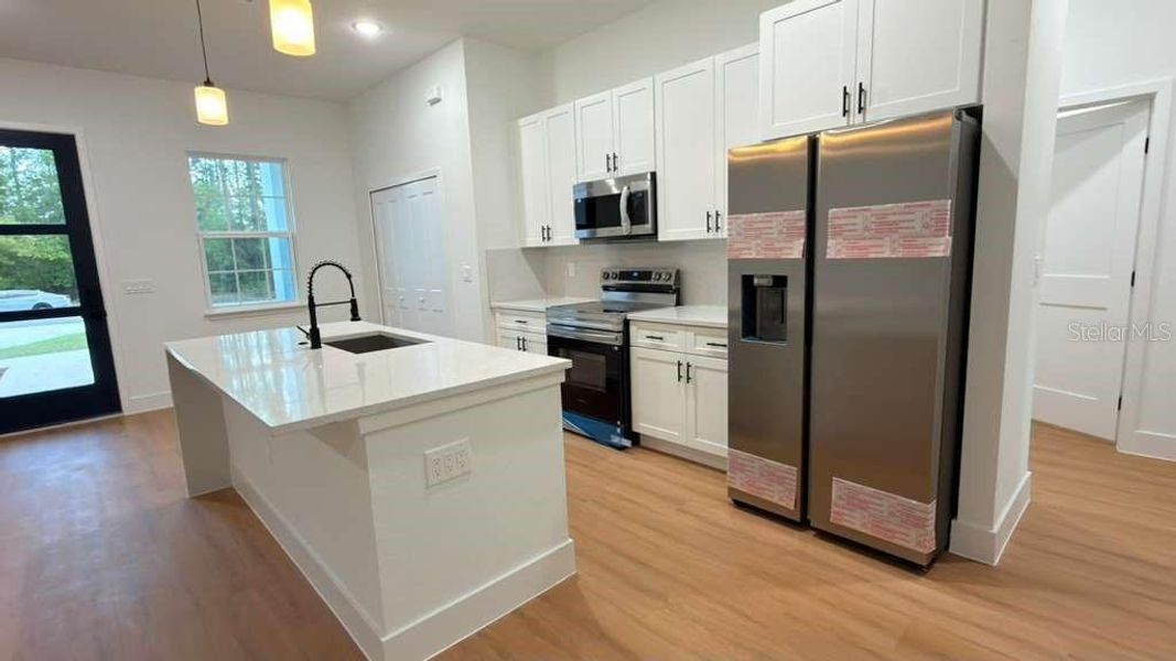 Furnished interior view inside a new home in , Citrus Springs (Image 19).