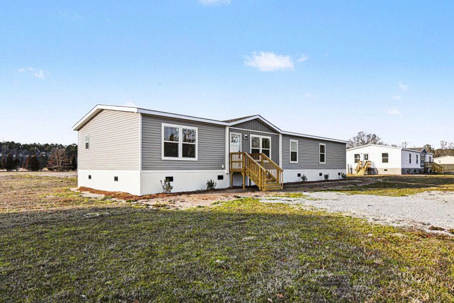 Exterior details and patio area of a home in , Ridgeville (Image 12). Exterior details and patio area of a home in , Ridgeville (Image 12).