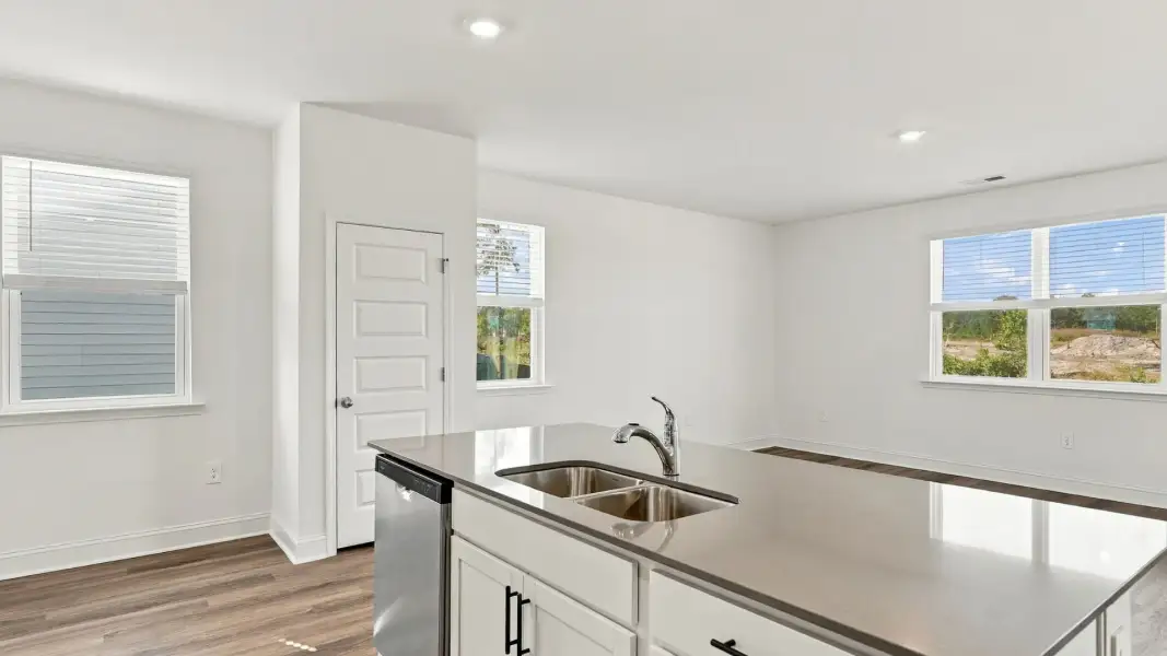 Furnished interior view inside a new home in The Lakes at North Glynn, Brunswick (Image 9).