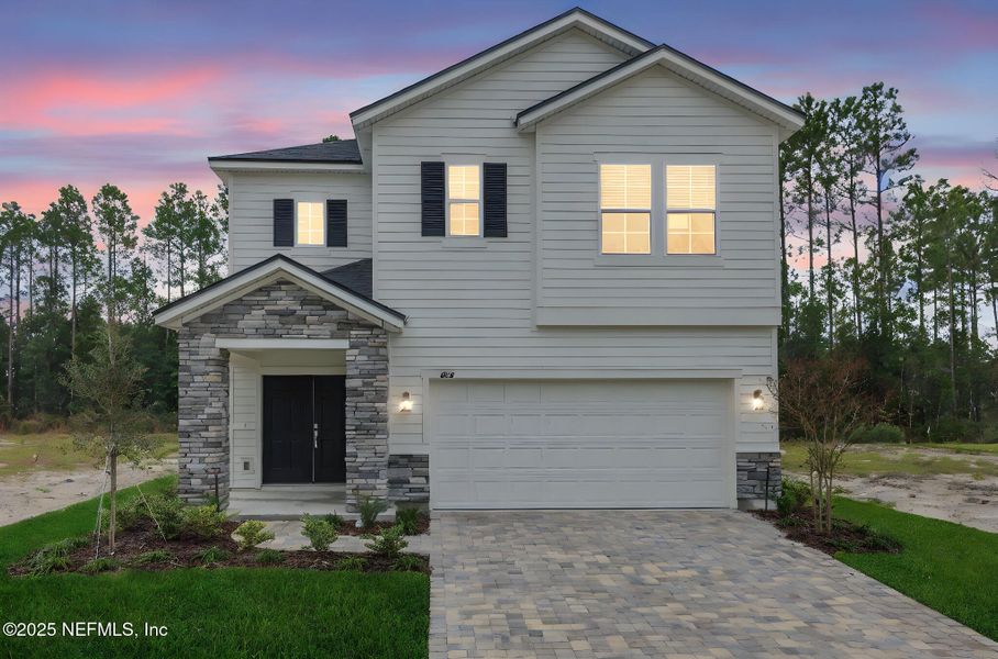 Front exterior of a new home in Brook Forest - Single Family Homes, St. Augustine, FL, highlighting curb appeal (Image 19). Front exterior of a new home in Brook Forest - Single Family Homes, St. Augustine, FL, highlighting curb appeal (Image 19).