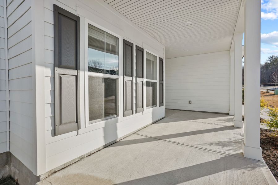 Exterior details and patio area of a home in Forest Creek, Waxhaw (Image 28).