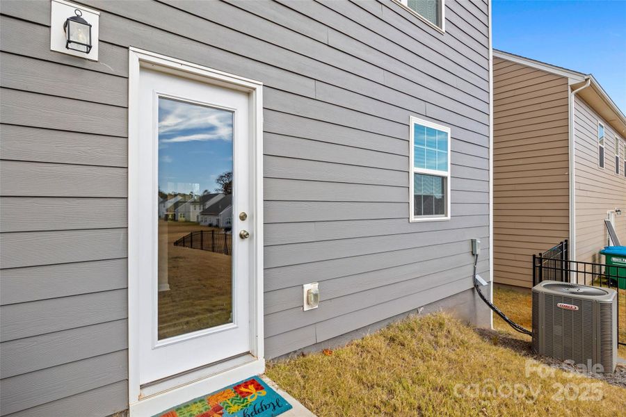 Exterior details and patio area of a home in Creekside Cottages, Bessemer City (Image 3).