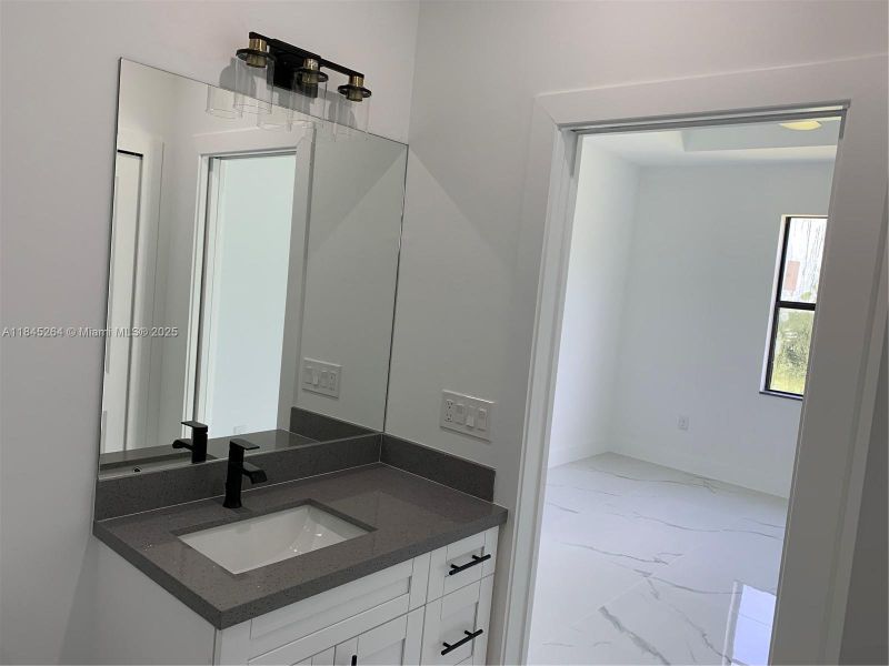 Furnished interior view inside a new home in , Lehigh Acres (Image 6).