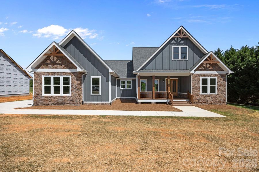 Front exterior of a new home in , Statesville, NC, highlighting curb appeal (Image 2). Front exterior of a new home in , Statesville, NC, highlighting curb appeal (Image 2).