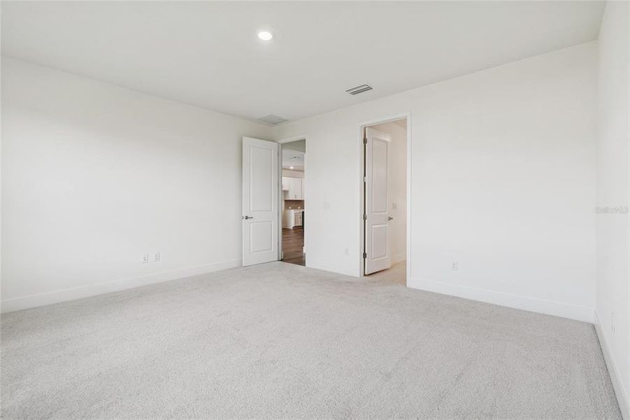 Spacious, unfurnished interior of a new home in North River Ranch - Cottage Series, Parrish (Image 13).