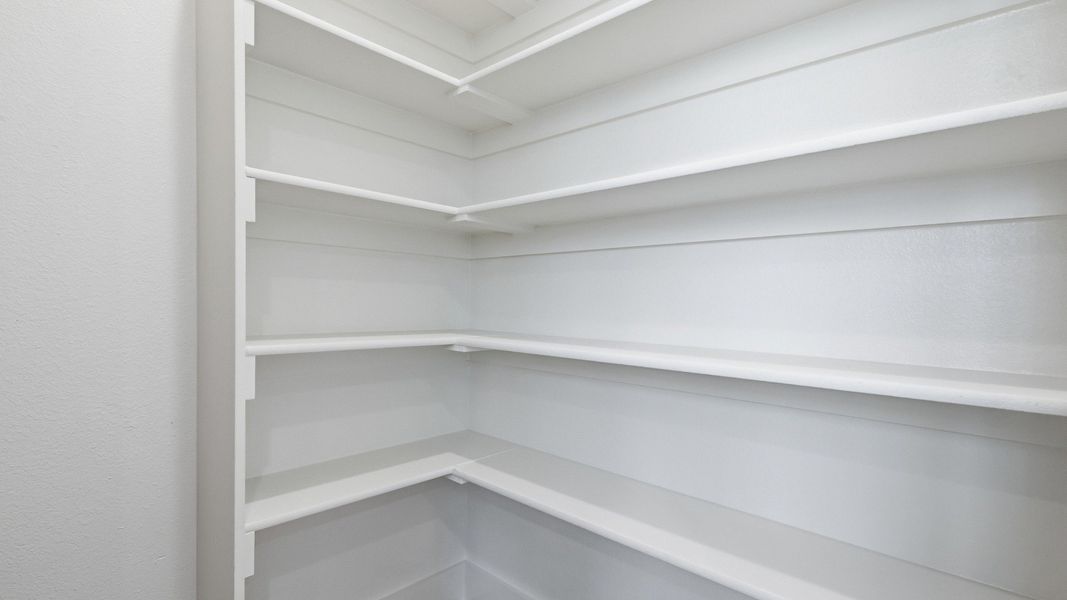 Furnished interior view inside a new home in Collin Creek, Plano (Image 32).