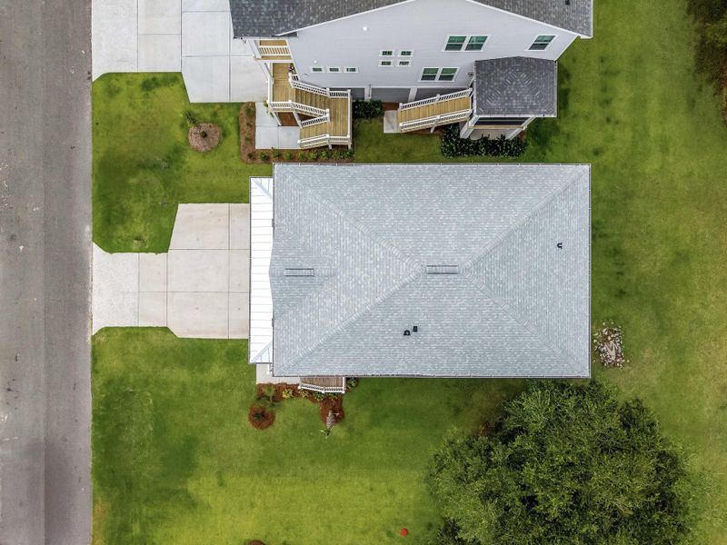 Exterior details and patio area of a home in Overlook at Copahee Sound, Awendaw (Image 29).