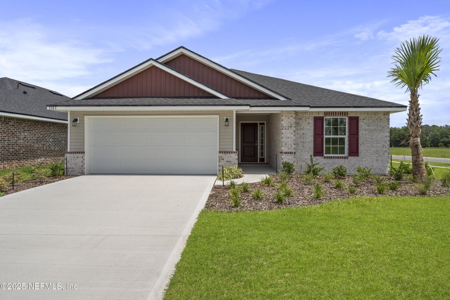 Front exterior of a new home in Shadow Crest at Rolling Hills, Green Cove Springs, FL, highlighting curb appeal (Image 2). Front exterior of a new home in Shadow Crest at Rolling Hills, Green Cove Springs, FL, highlighting curb appeal (Image 2).