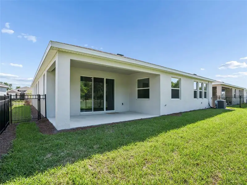 Exterior details and patio area of a home in , Ocala (Image 3). Exterior details and patio area of a home in , Ocala (Image 3).