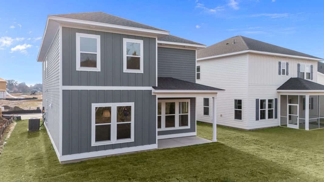 Exterior details and patio area of a home in Blue Heron Retreat, Little River (Image 4).