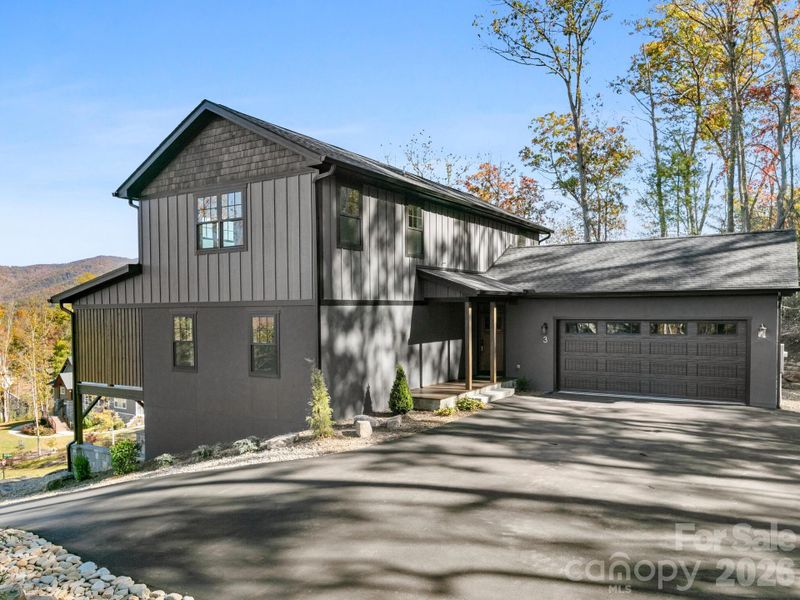 Front exterior of a new home in , Fairview, NC, highlighting curb appeal (Image 22).