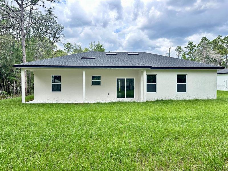 Exterior details and patio area of a home in , Citrus Springs (Image 23).