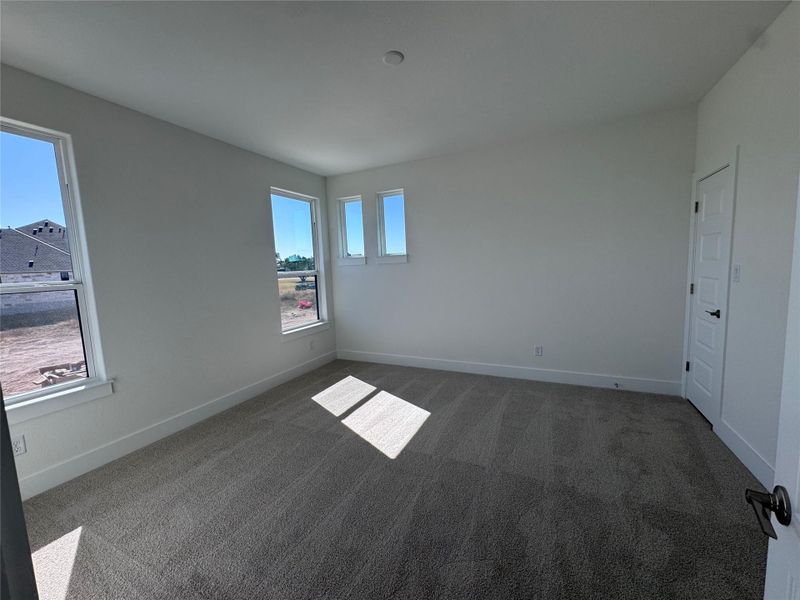 Spacious, unfurnished interior of a new home in ClearWater Ranch, Liberty Hill (Image 24).