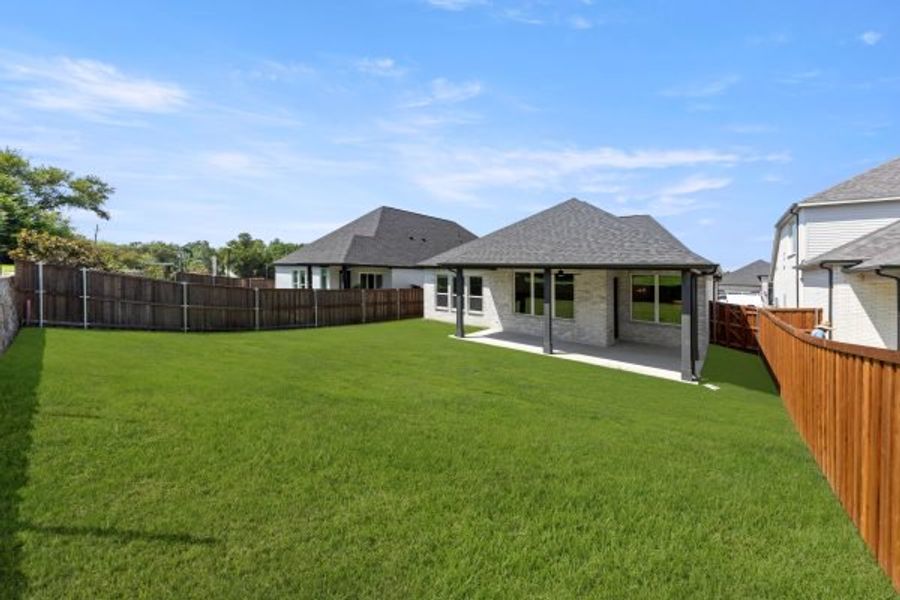 Exterior details and patio area of a home in The Highlands, Rockwall (Image 28).