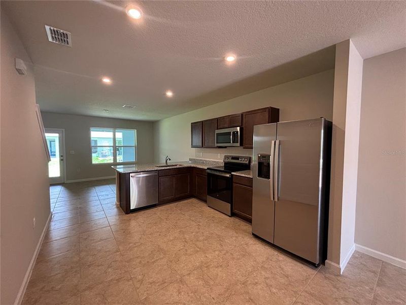 Furnished interior view inside a new home in Edison Pointe, South Daytona (Image 5). Furnished interior view inside a new home in Edison Pointe, South Daytona (Image 5).