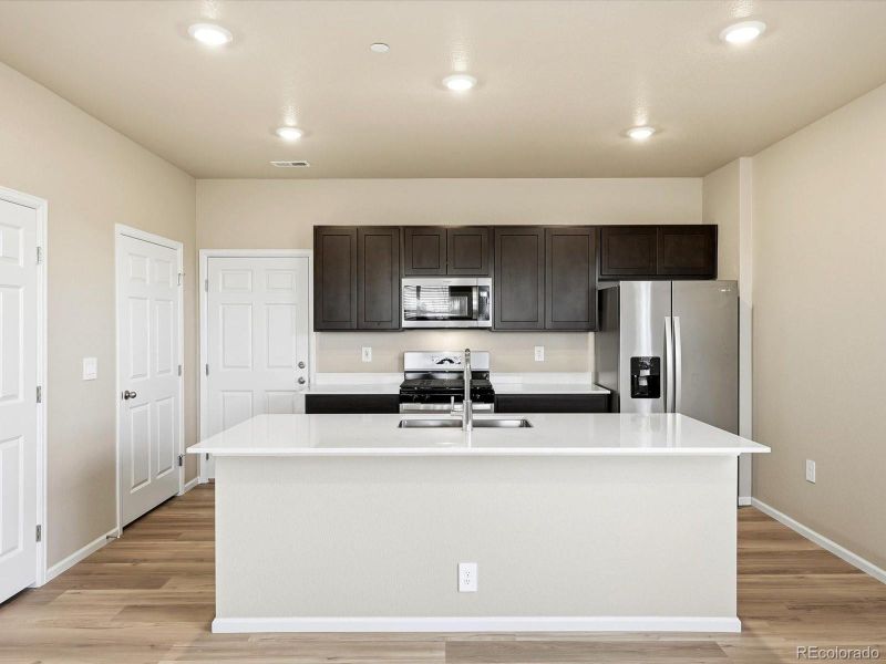 Furnished interior view inside a new home in , Aurora (Image 6).