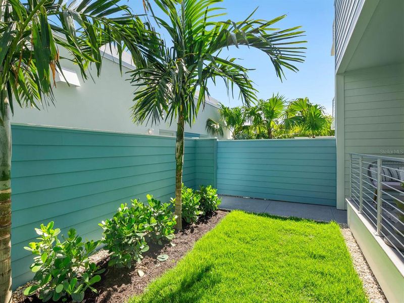Exterior details and patio area of a home in , Sarasota (Image 26).