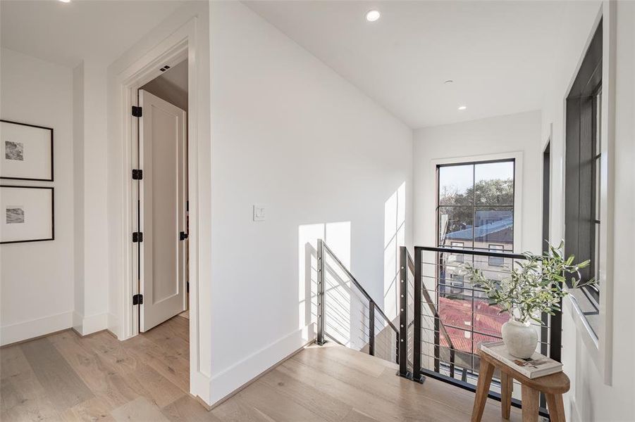 Hallway featuring light wood-type flooring